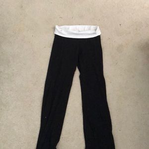 Black yoga pants with white waistband